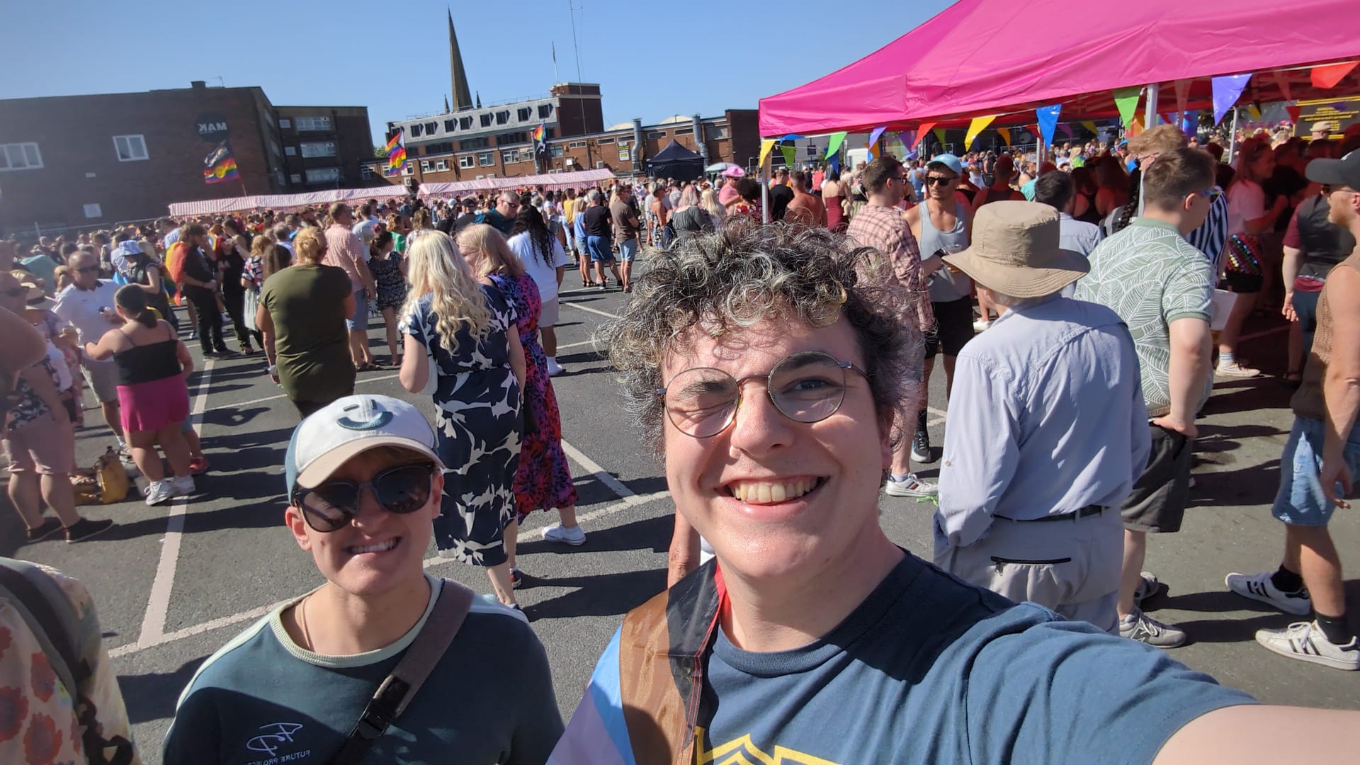 A selfie of Ash takken at Pride.